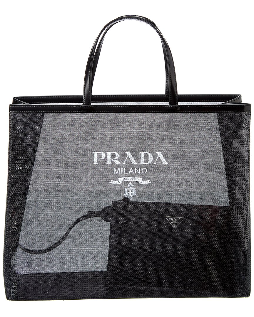 PRADA on X: Shimmer upon shimmer. A diaphanous, sequined mesh tote bag  combines the classic #Prada lettering logo with a modern, leather-trimmed,  double-handle design that sparkles day and night. Discover more #PradaGifts