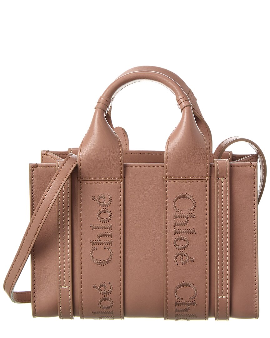 Shop Chloé Woody Mini Leather Tote In Pink