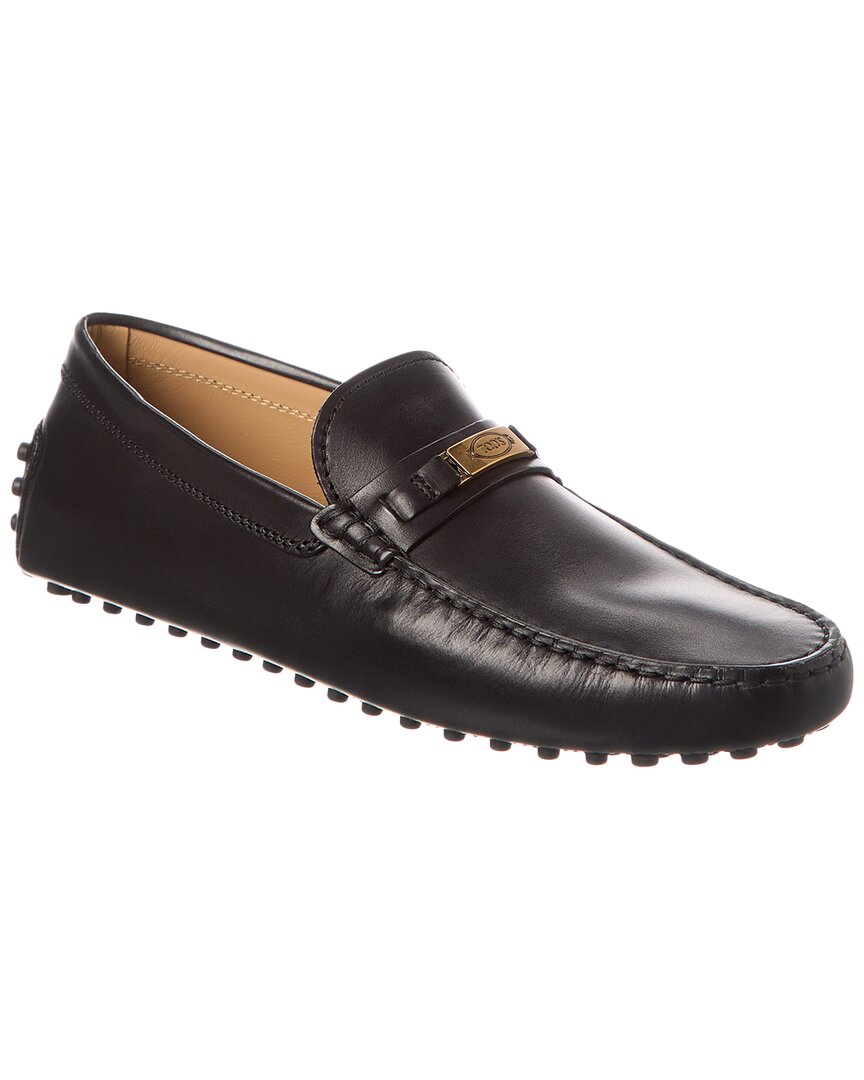 Tod's Gold-tone Logo Engraved Loafers In Black