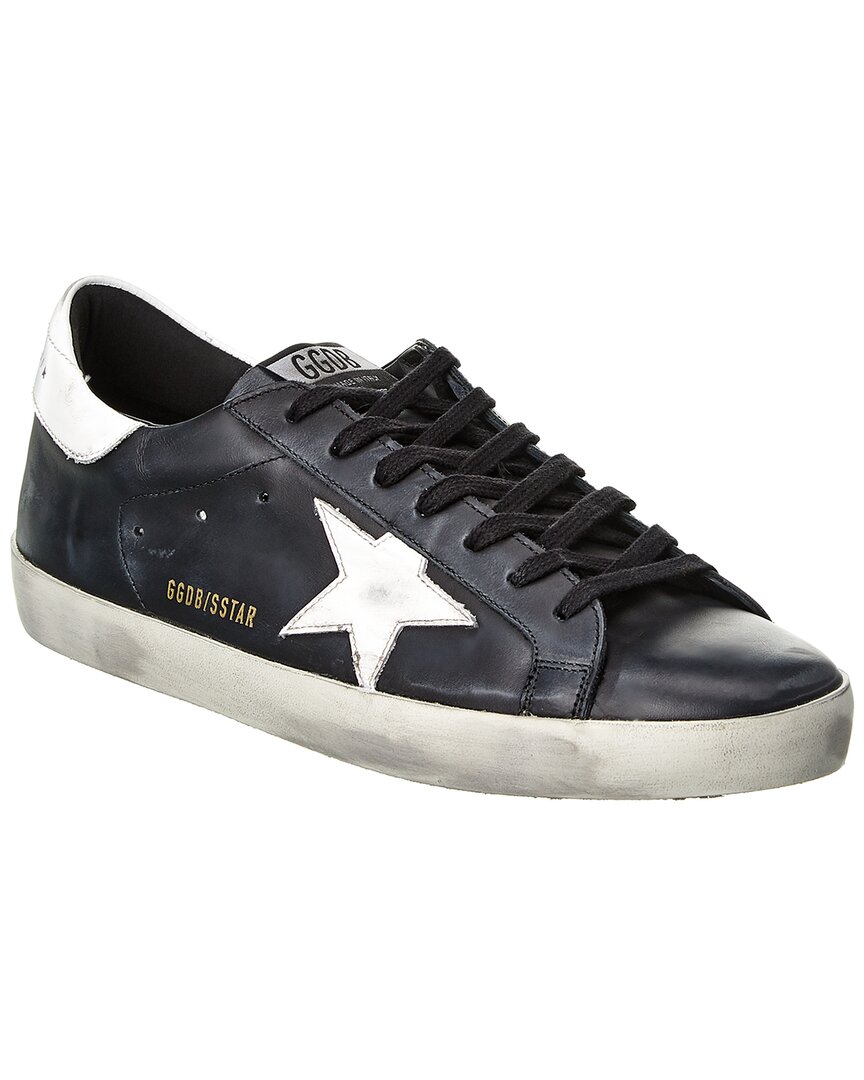 Golden Goose 'super-star' Black Low Top Sneakers With Logo Patch And Suede Details In Leather Man In Black