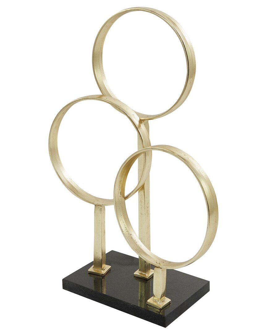 COSMOLIVING BY COSMOPOLITAN COSMOLIVING BY COSMOPOLITAN ABSTRACT GOLD ALUMINUM 3 RINGS SCULPTURE WITH BLACK BASE