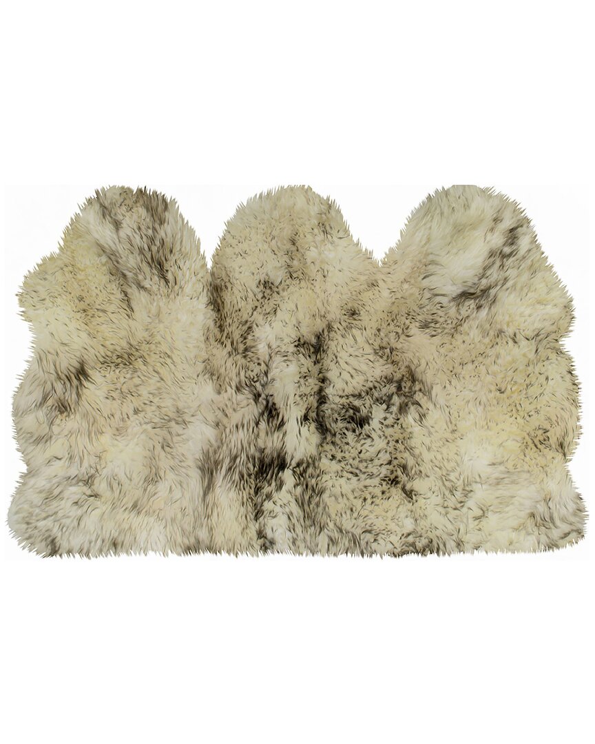 Shop Natural Group Triple Sheepskin Rug In Chocolate