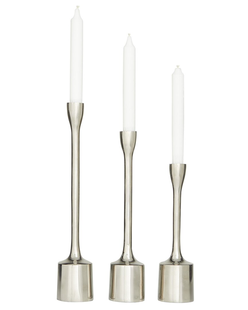 COSMOLIVING BY COSMOPOLITAN COSMOLIVING BY COSMOPOLITAN SET OF 3 SILVER ALUMINUM TAPERED CANDLE HOLDER
